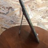 Old beveled Venetian mirror with engraved flower decoration