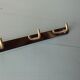 Two chrome tea towel hooks