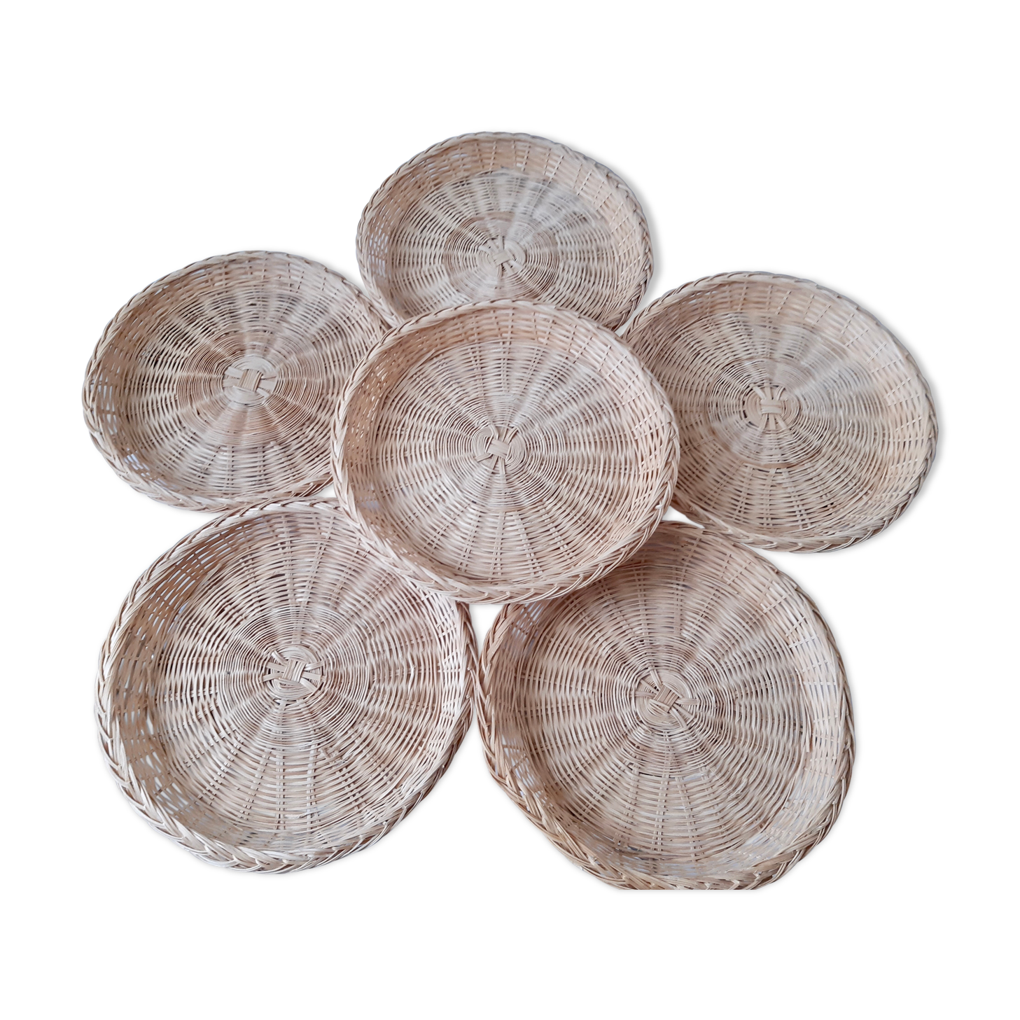 Underside of vintage wicker plates 70s