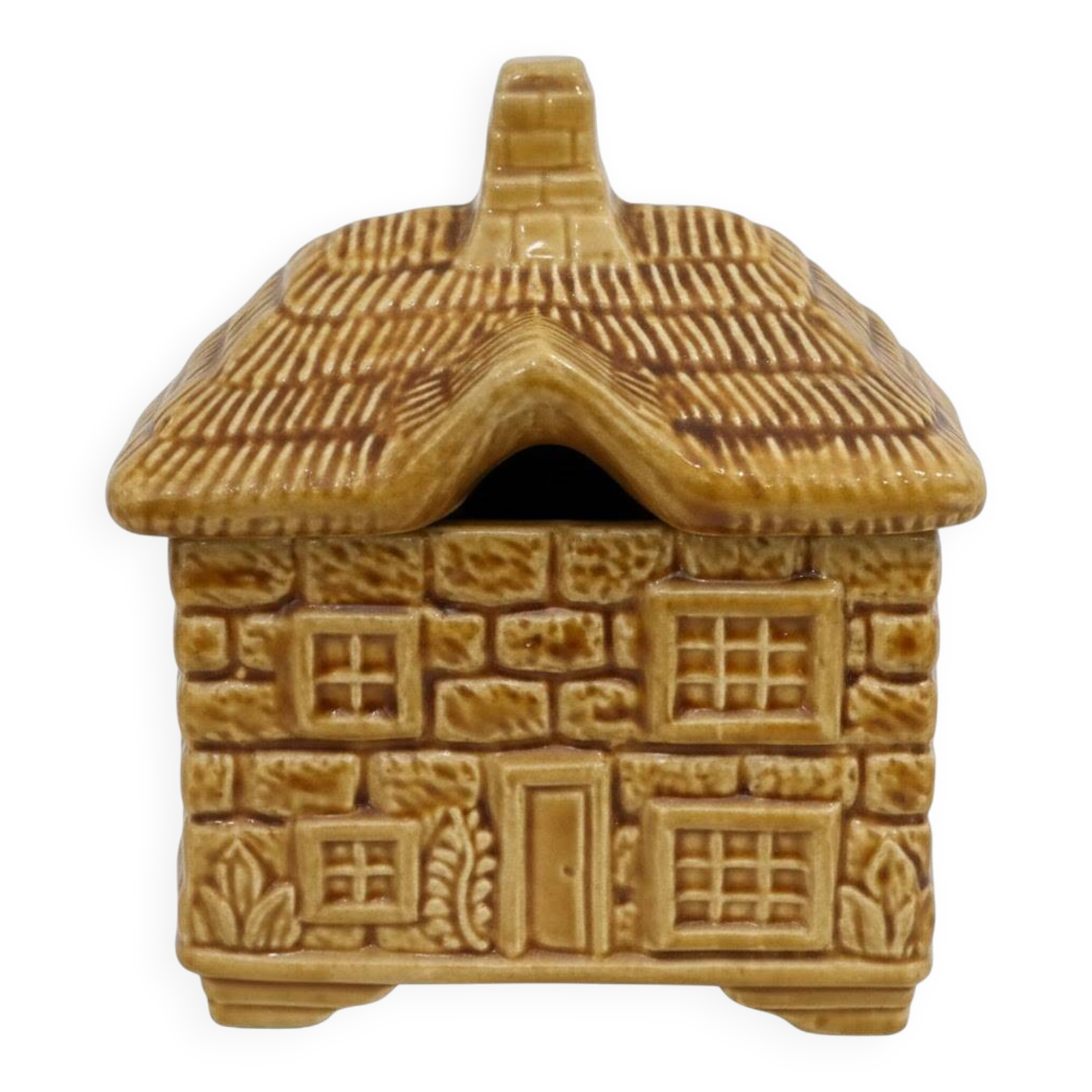 Devonway jam pot in the shape of a cottage with a thatched roof.