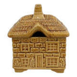 Devonway jam pot in the shape of a cottage with a thatched roof.