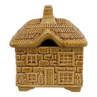 Devonway jam pot in the shape of a cottage with a thatched roof.