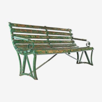 Wooden bench with green patina