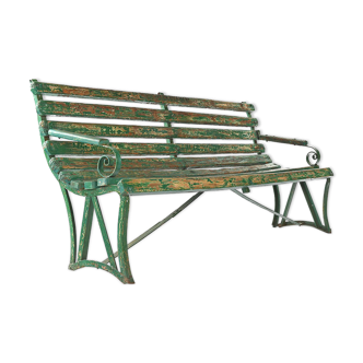 Wooden bench with green patina