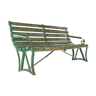 Wooden bench with green patina
