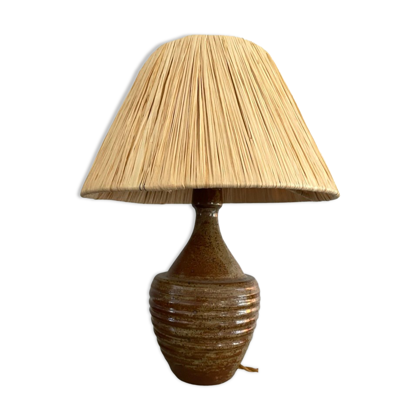 Sandstone lamp and raffia