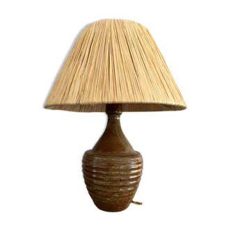 Sandstone lamp and raffia