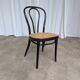 Chaise de salle à manger vintage style Thonet en bois noir et assise en cannage 1970