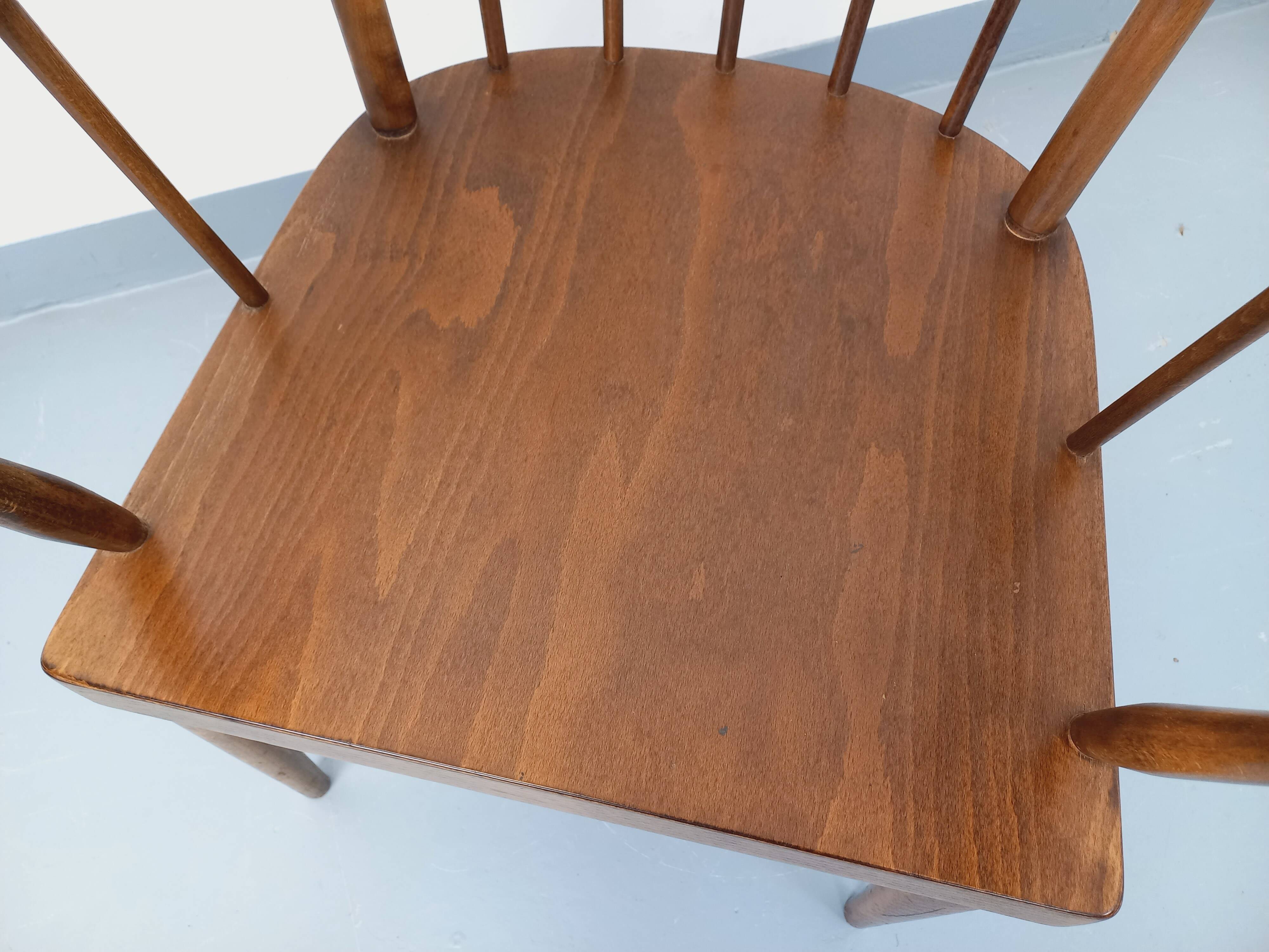 Vintage wooden armchair Baumann model Éventail from the 1960s.