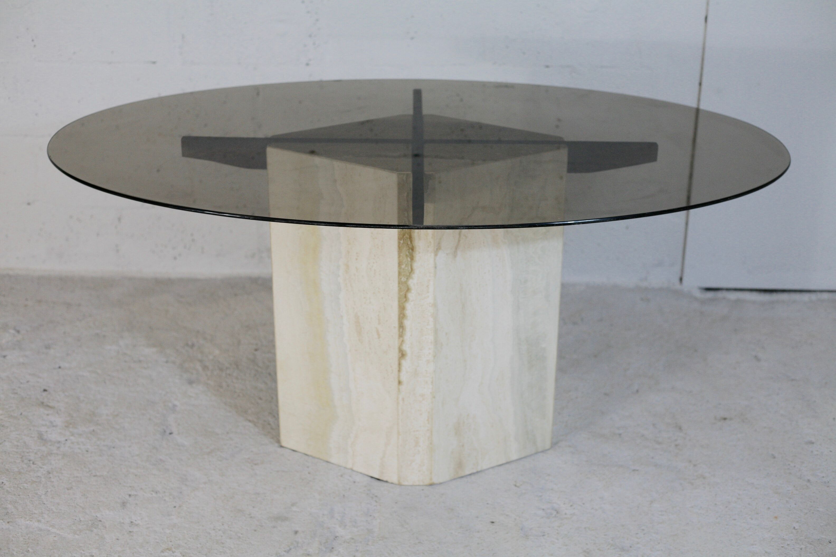 Living table, Comblanchian stone base and elliptical tray in smoked glass, Italy, 1970