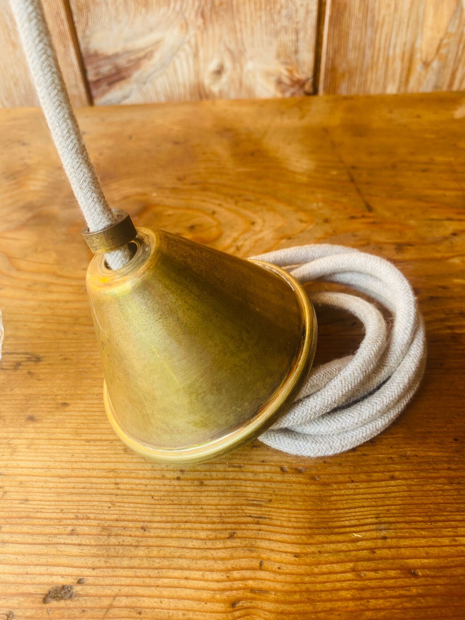 Glass and brass suspension.