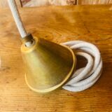 Glass and brass suspension.