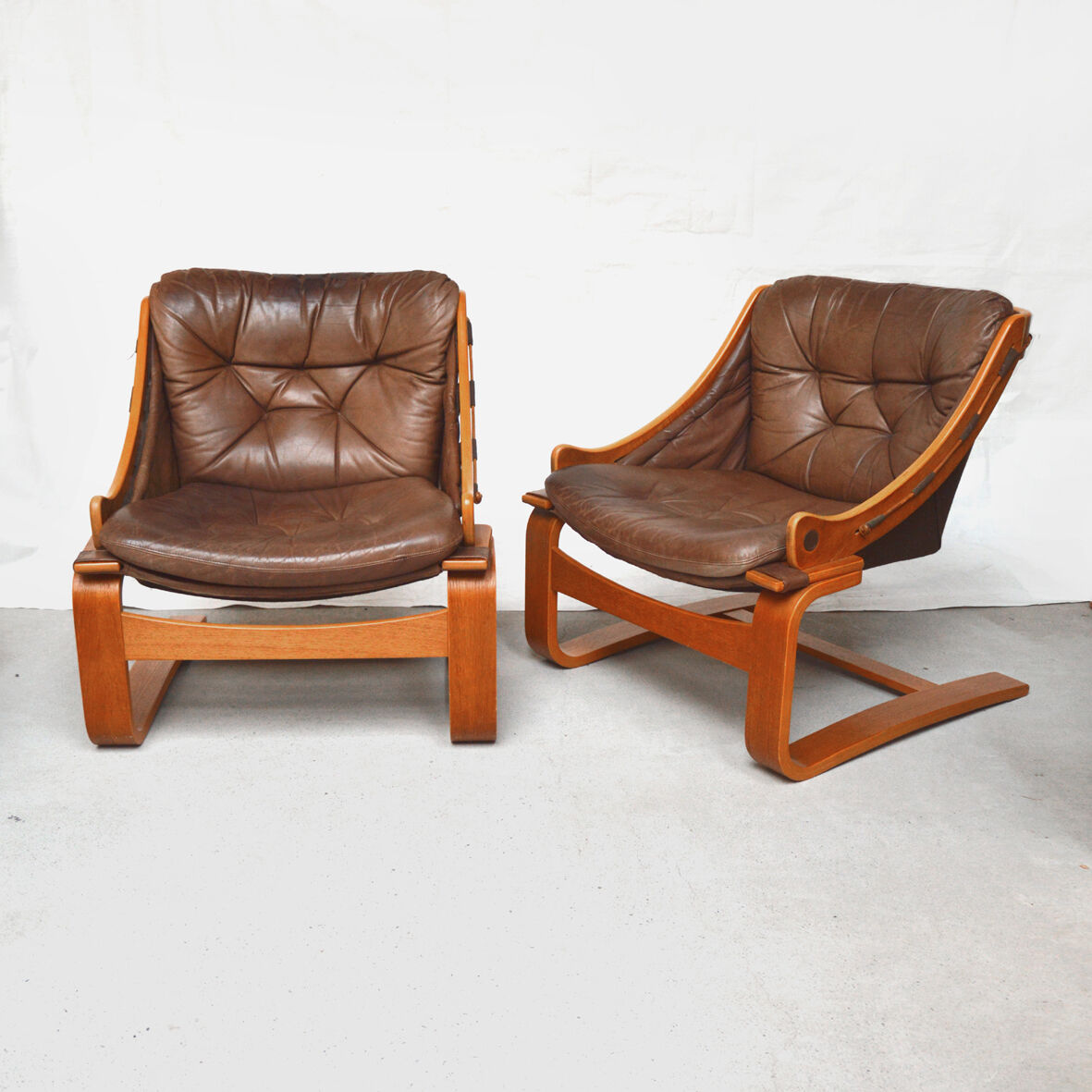 Pair of Danish armchairs in teak and leather 1970