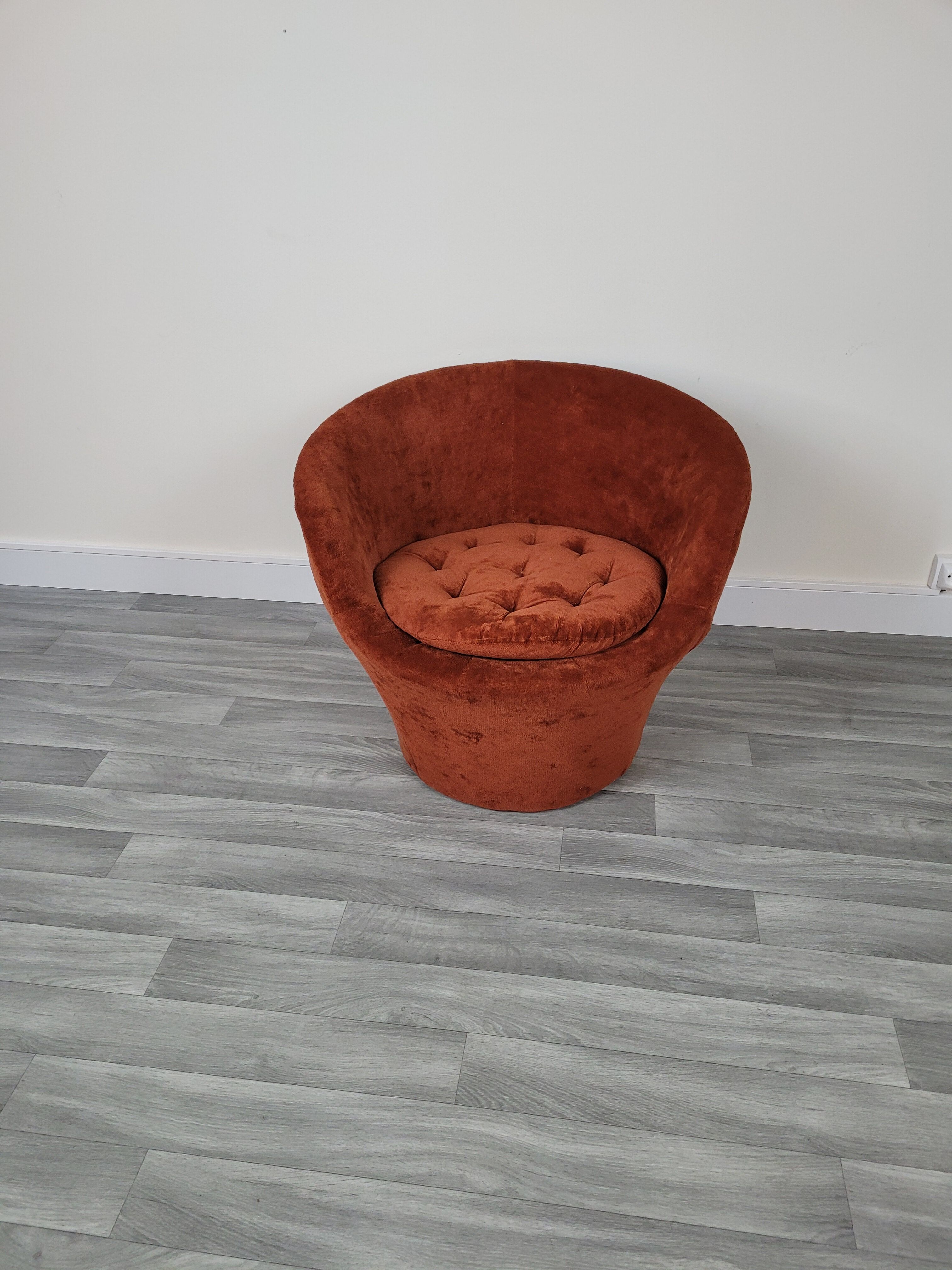 Orange velvet armchair