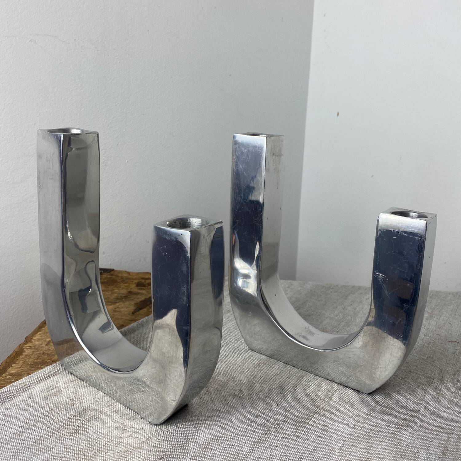 Designer candle holders in brushed aluminum