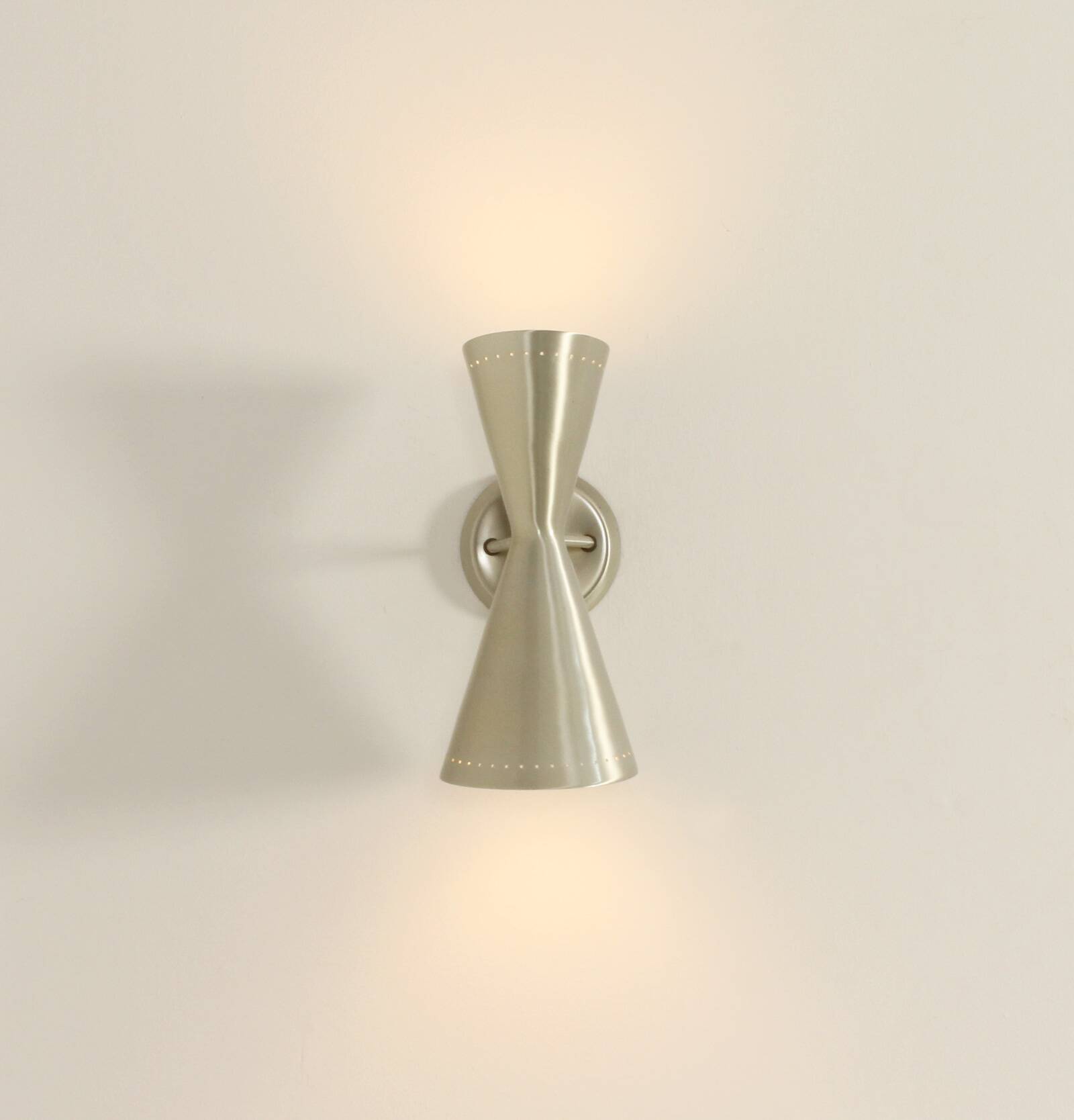 Large diabolo wall light by Litecraft, California, United States, 1950s.