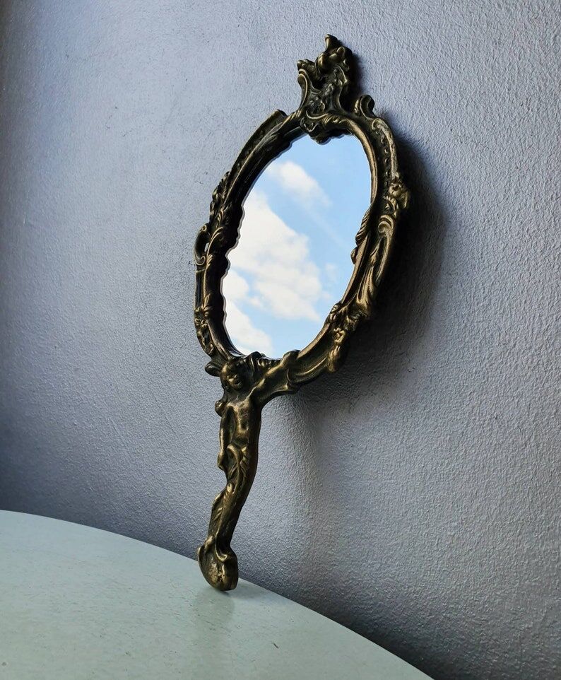 Hand mirror in brass art deco 30 years France