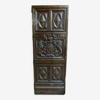 Walnut door carved with 18th century coat of arms