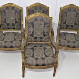 4 armchairs and a gilded wooden sofa Louis XVI style