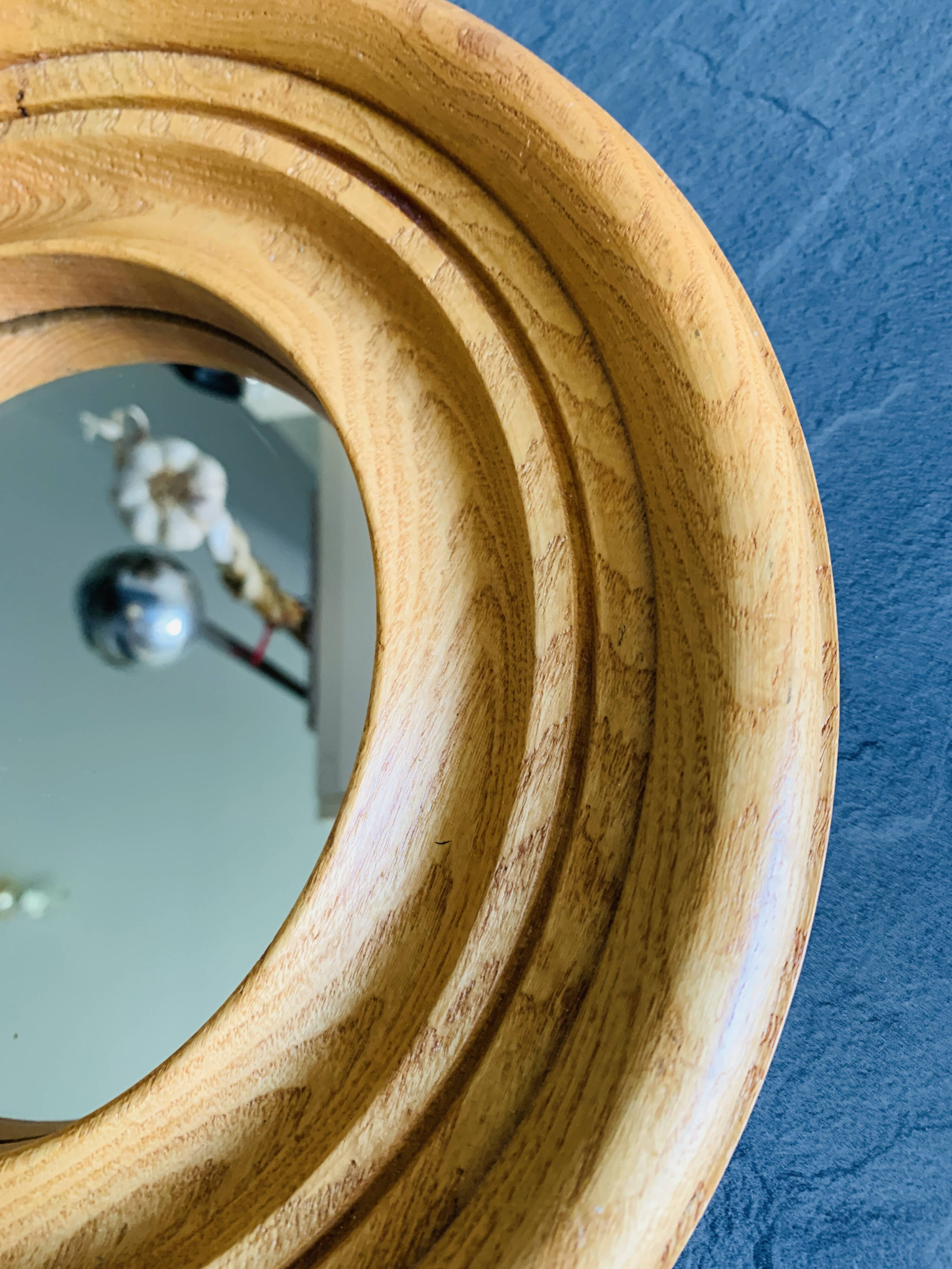 Vintage round wooden mirror