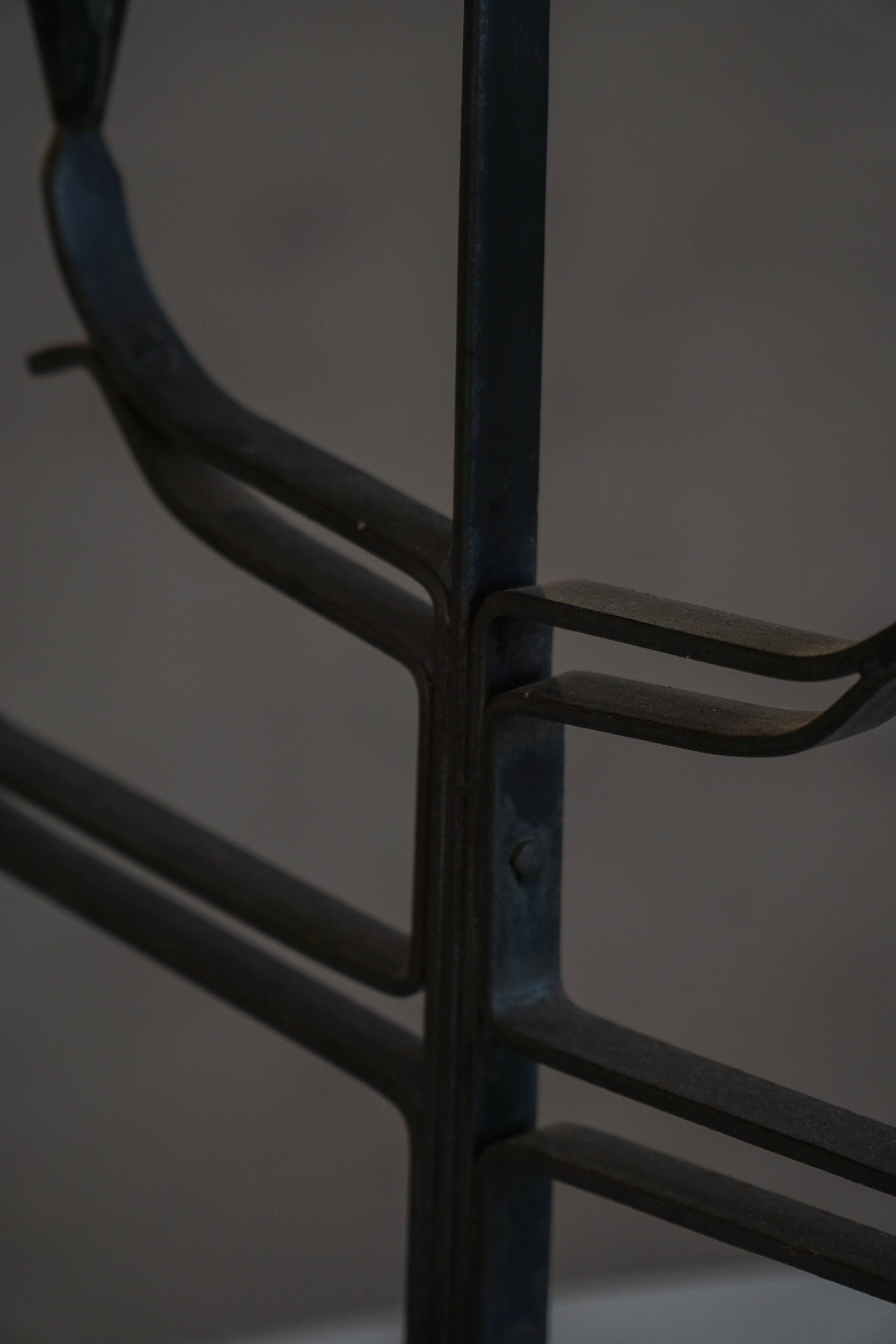 Brutalist Scandinavian candlestick in wrought iron and metal from the mid-20th century.