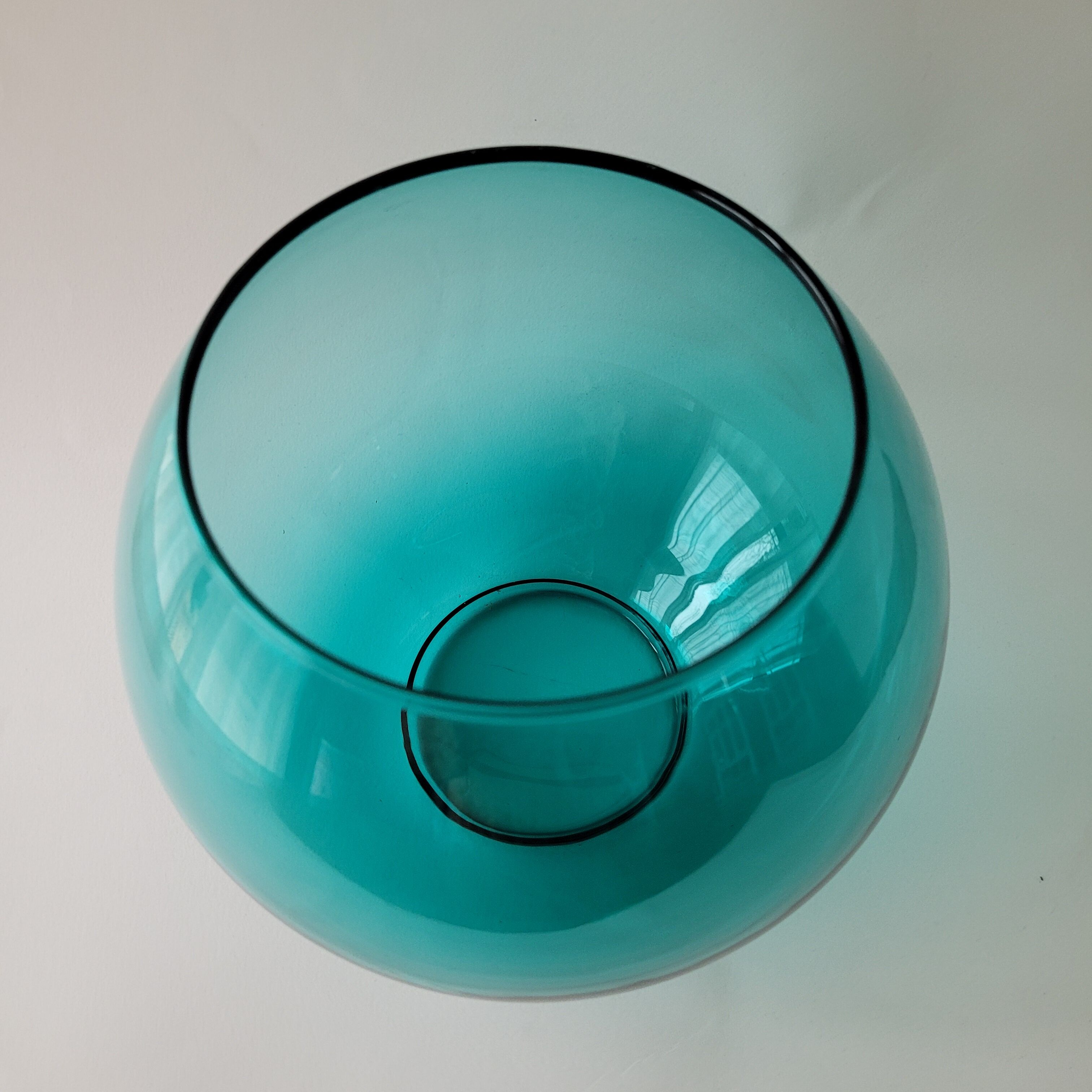 Round blue glass vase