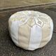 Pouf marocain rond en cuir bicolore beige blanc