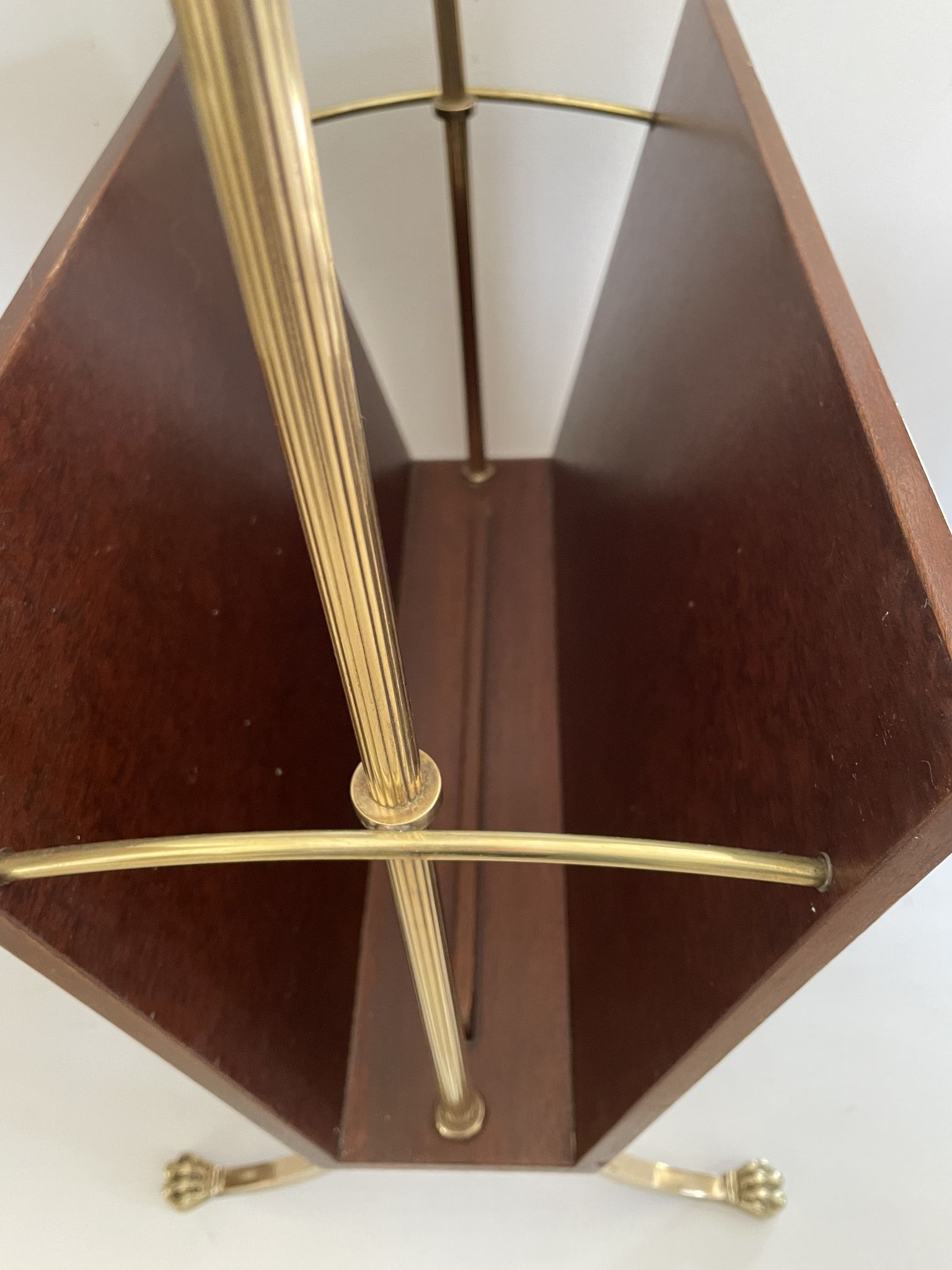 Magazine racks with claw feet by Maison Jansen