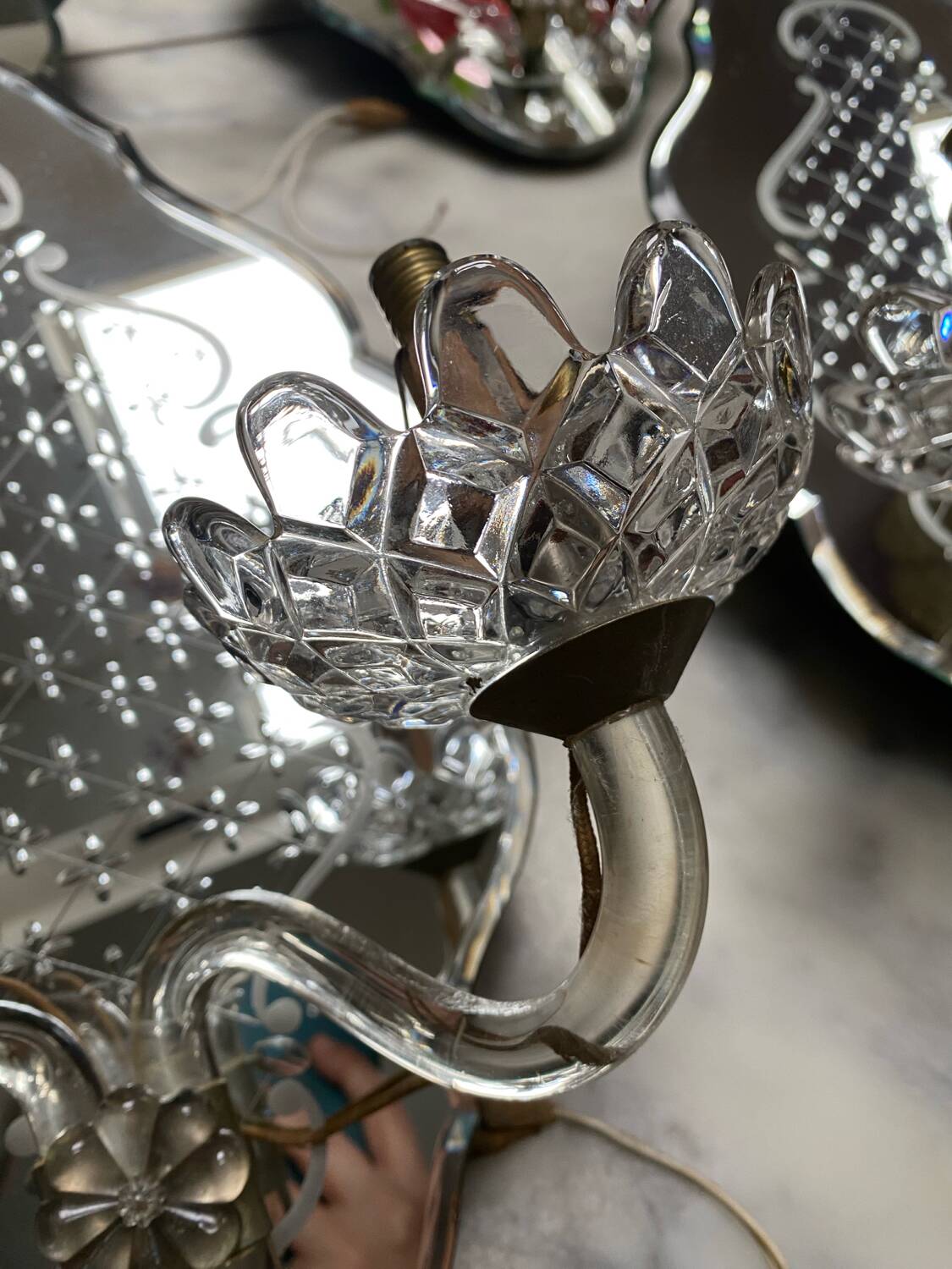 Venetian wall lights with Baccarat crystal mirror.