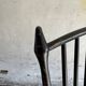 Black solid wood Scandinavian Windsor rocking chair — tall spindle back, mid-20th century