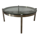 Vintage round coffee table with smoked glass and chrome.
