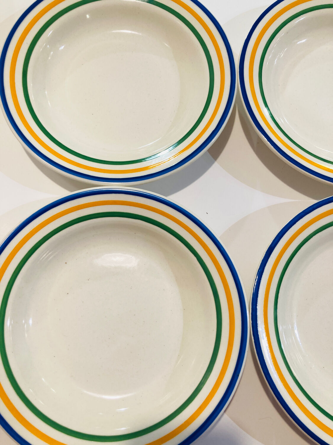 4 hollow faience plates with stripes made in Romania