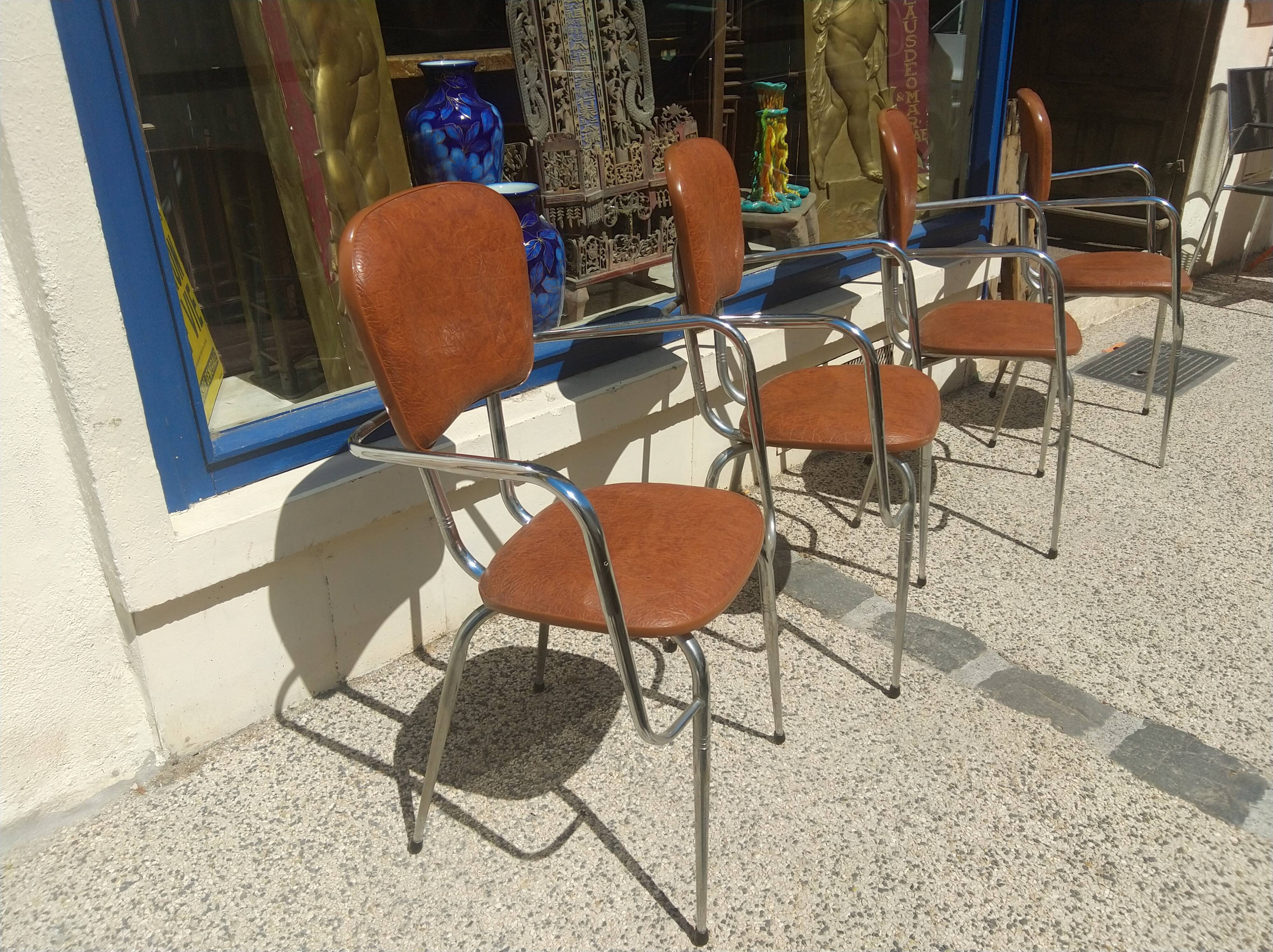 Set of 4 armchairs in chromed metal and brown imitation leather, circa 1960