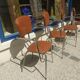 Set of 4 armchairs in chromed metal and brown imitation leather, circa 1960
