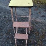 Yellow formica stool stepladder step