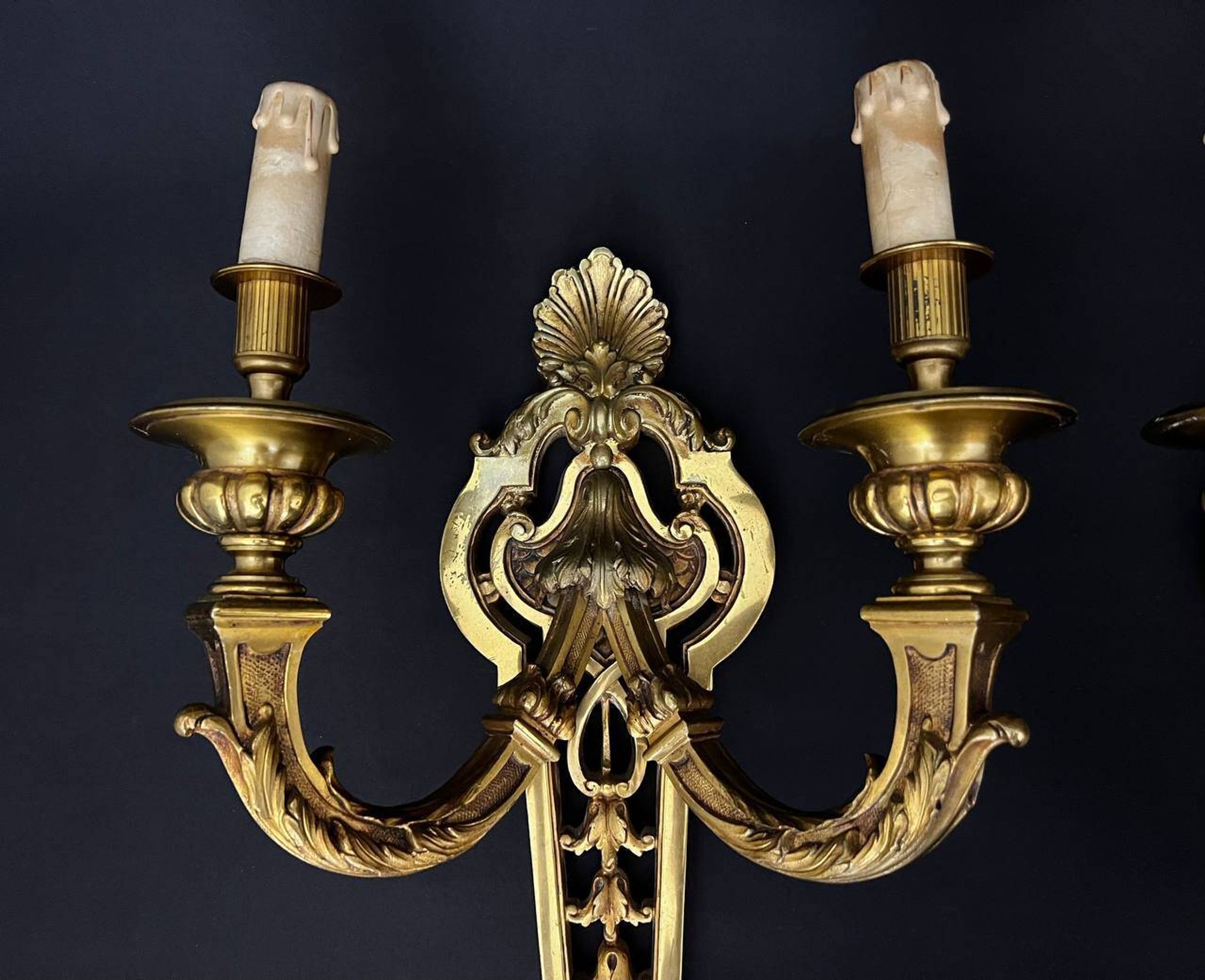 Large pair of gilt bronze wall sconces in the Louis XVI style.