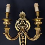 Large pair of gilt bronze wall sconces in the Louis XVI style.