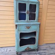 Blue patinated wooden display cabinet