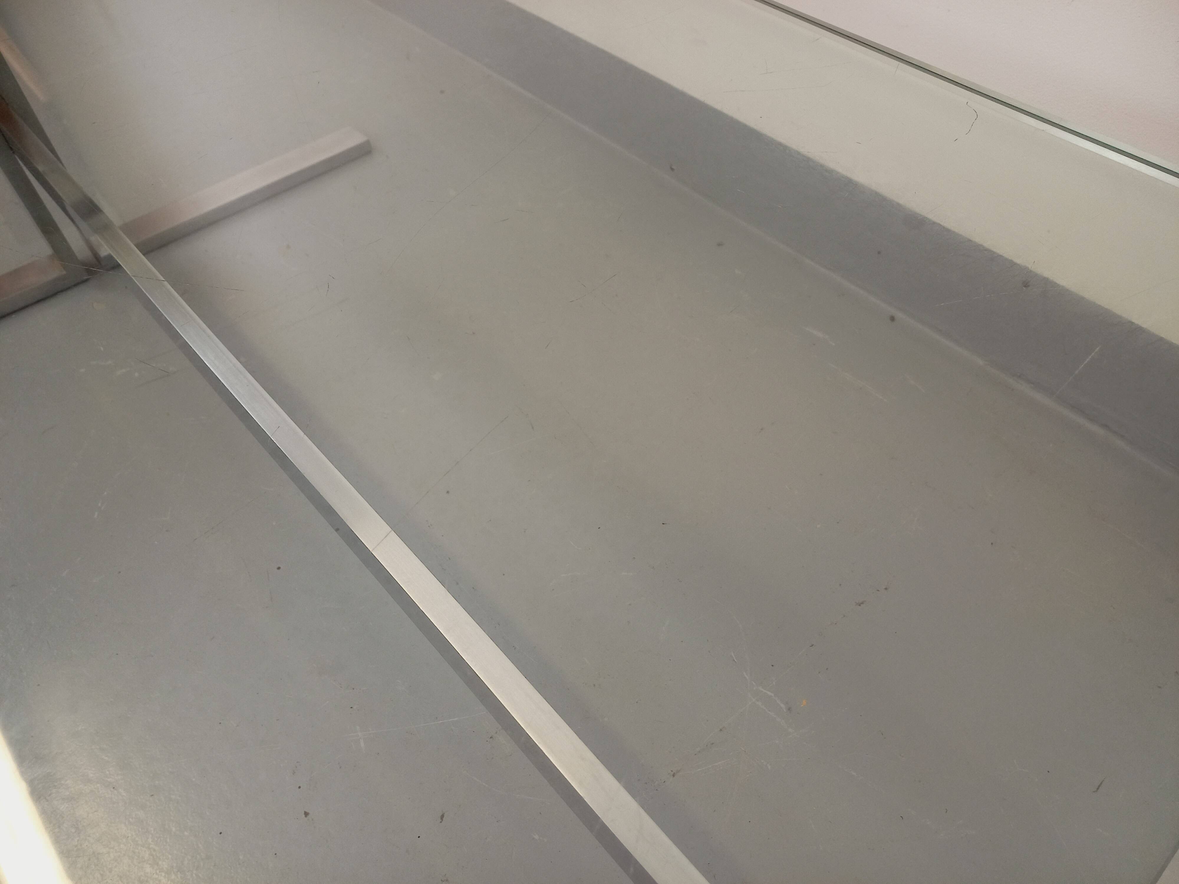 Vintage coffee table in transparent glass and cast aluminum from the 70s