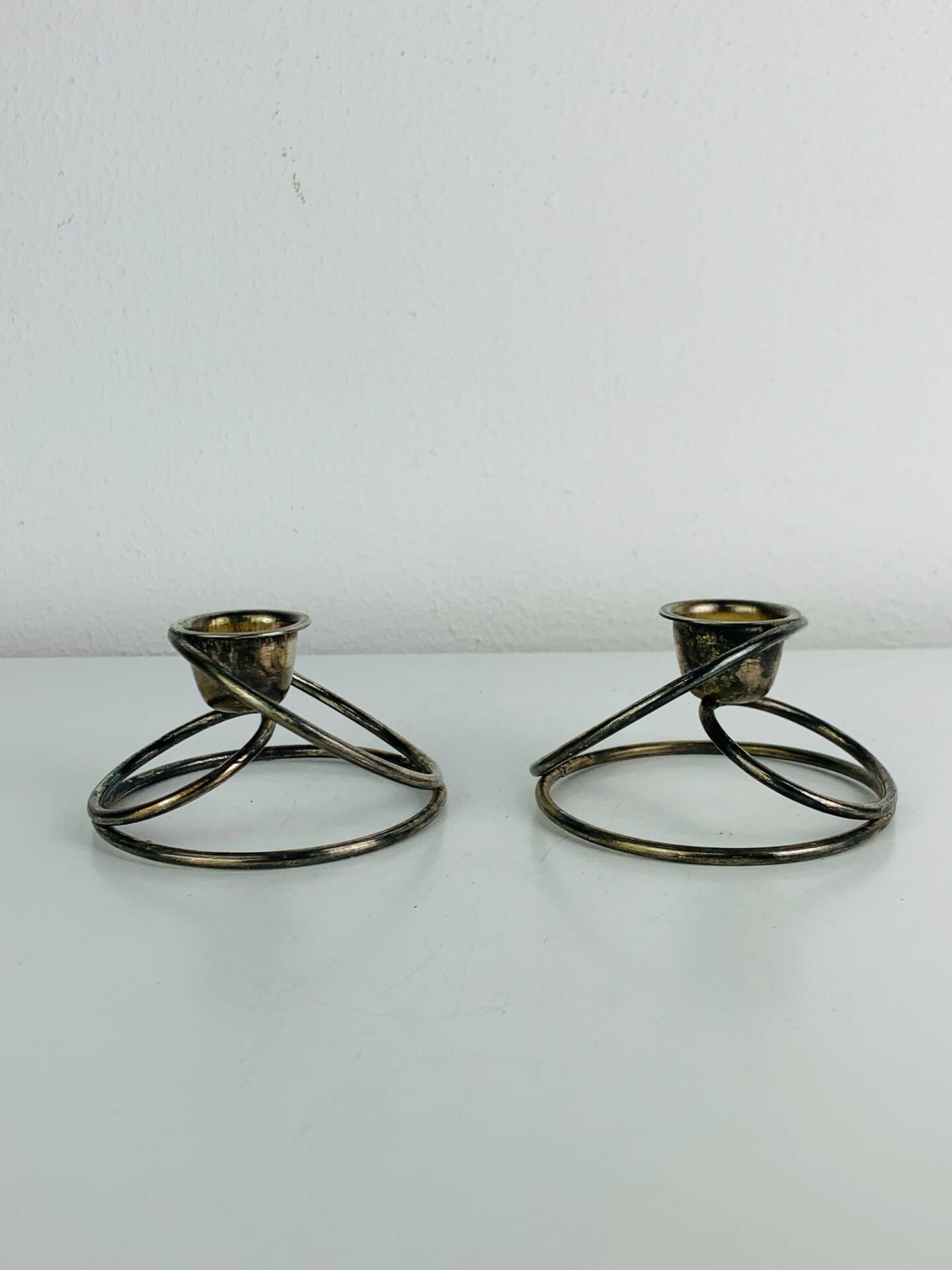 Pair of silver-plated metal candlesticks, vintage