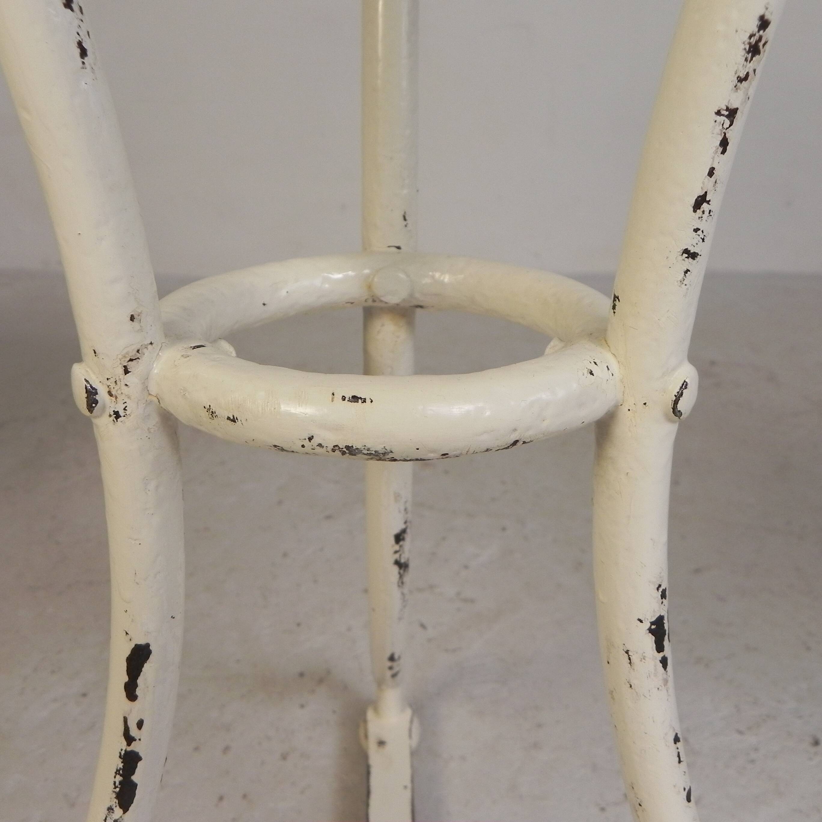 Bistro table with a marble top and brass edging, early 20th century.