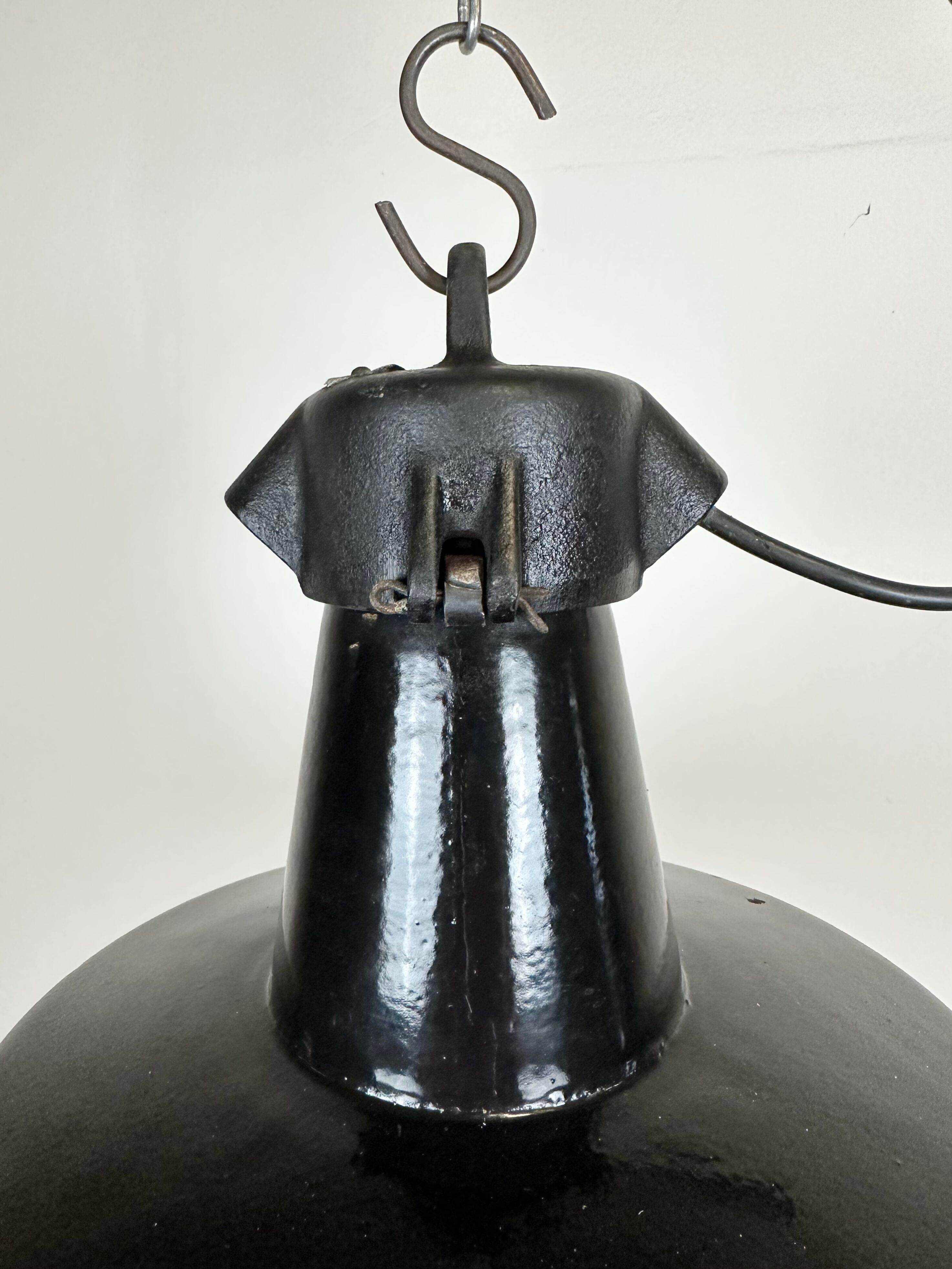 Industrial black enamel factory lamp with cast iron top, 1960s
