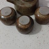 Teapot and its small bowls