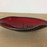 Empty black and red ceramic Elchinger pocket