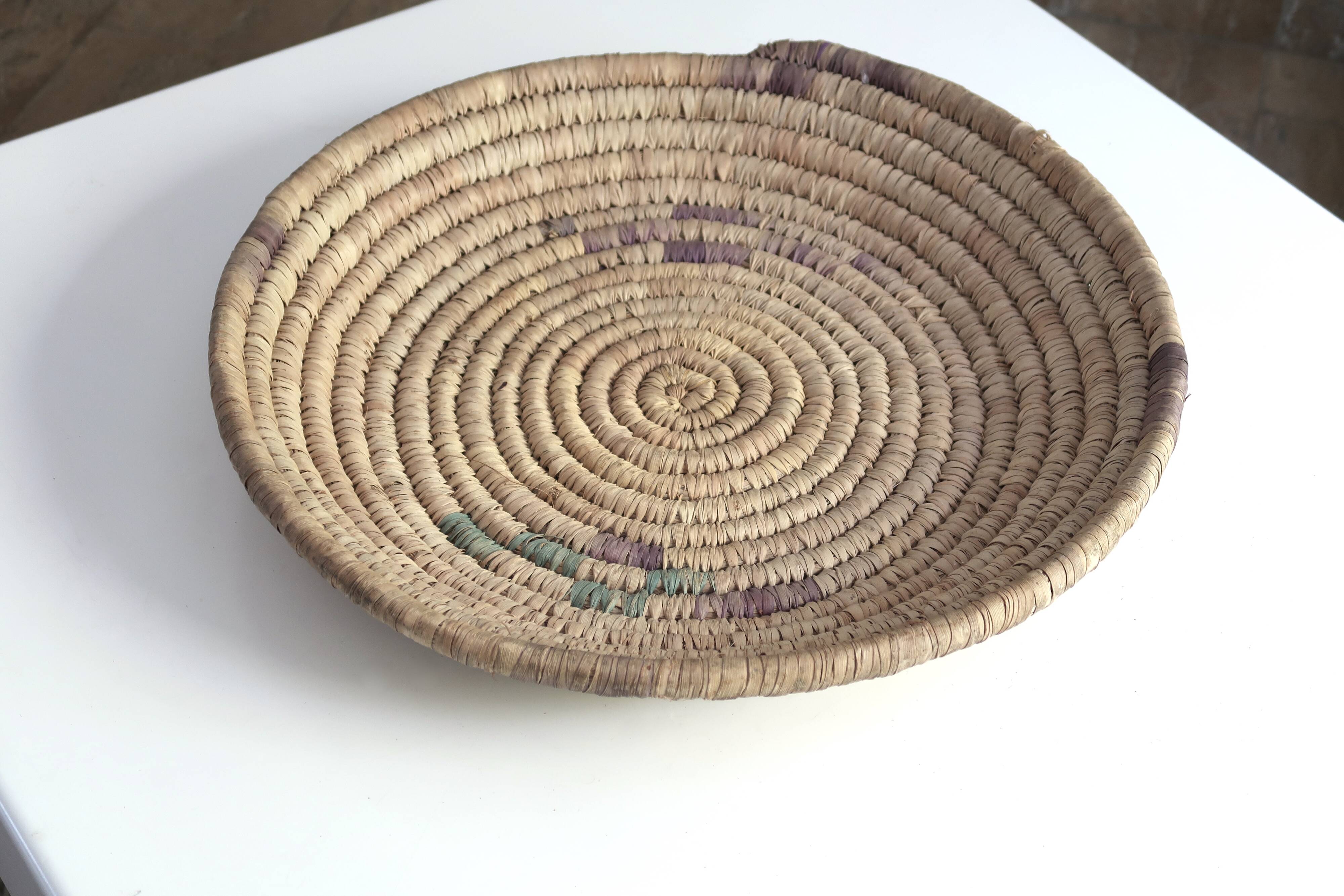 Braided round ethnic tray or wall decoration