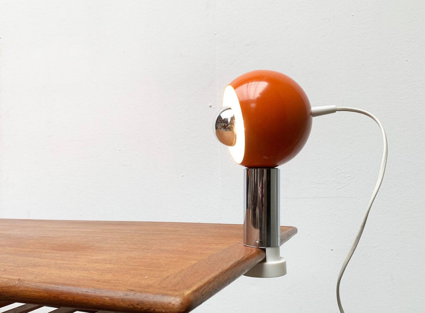 Mid-century space age magnetic clamp table or shelf lamp from the 1960s.