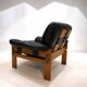Fauteuil brutaliste cuir et chêne, 1960
