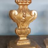 An antique pair of Louis XIV style paddle holders.