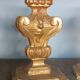 An antique pair of Louis XIV style paddle holders.