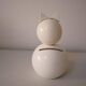 Wooden piggy bank, white cat